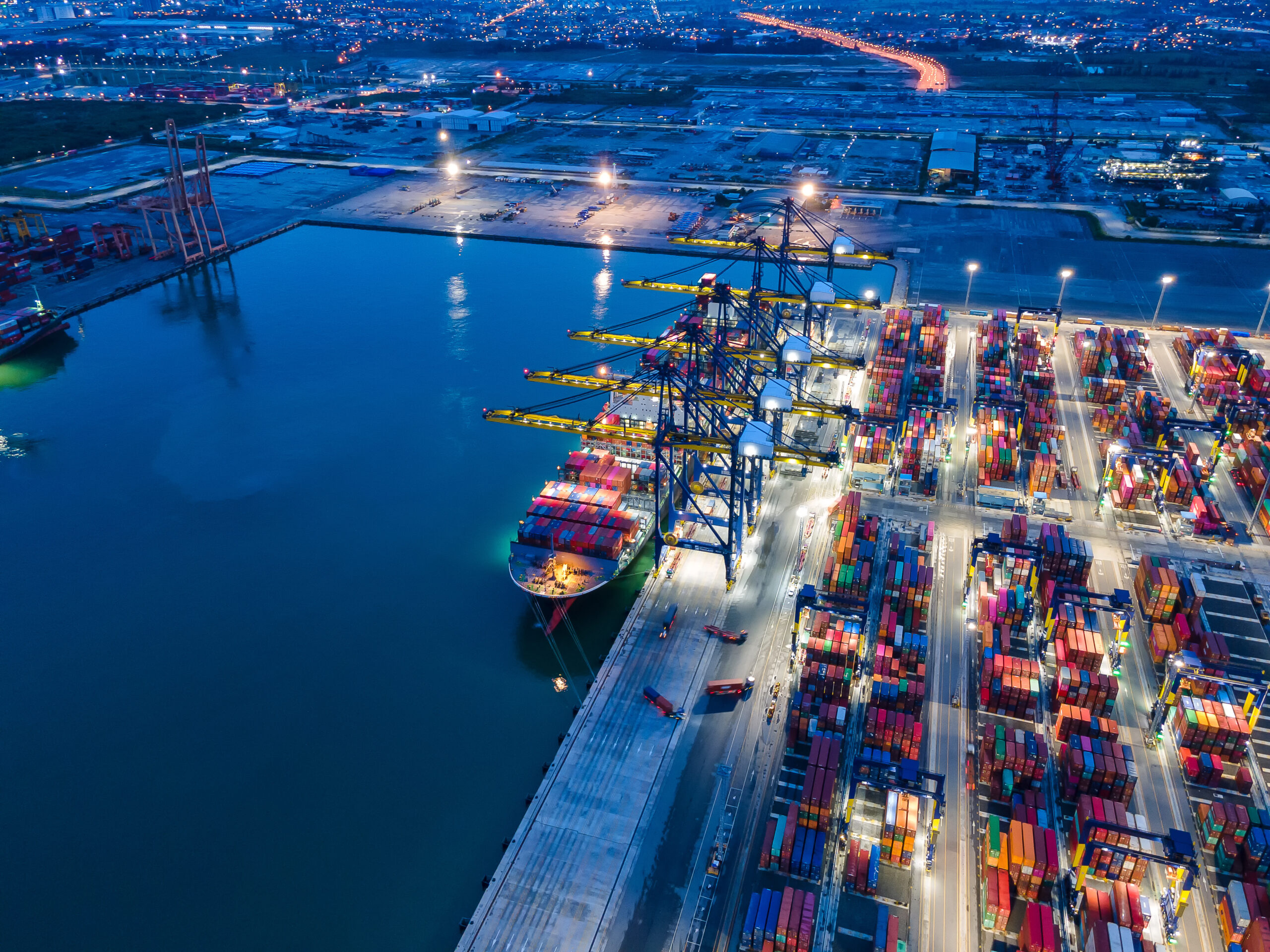 container , container ship in export and import business and logistics. shipping cargo to harbor by crane. water transport international. aerial view and top view.